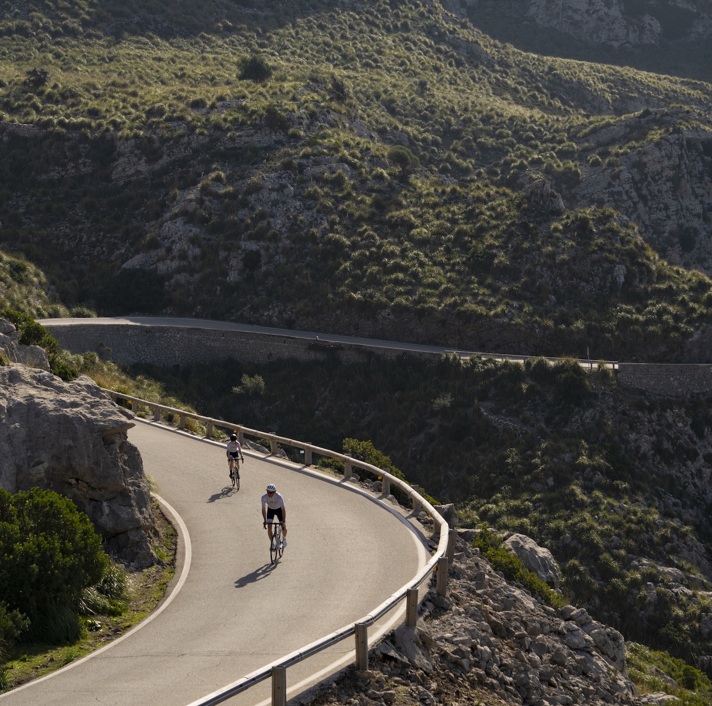 Cylists riding Sa Calobra near el Nus de Sa Corbata